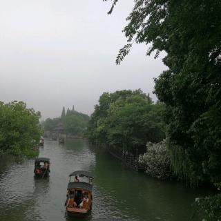 芳草長堤下一句